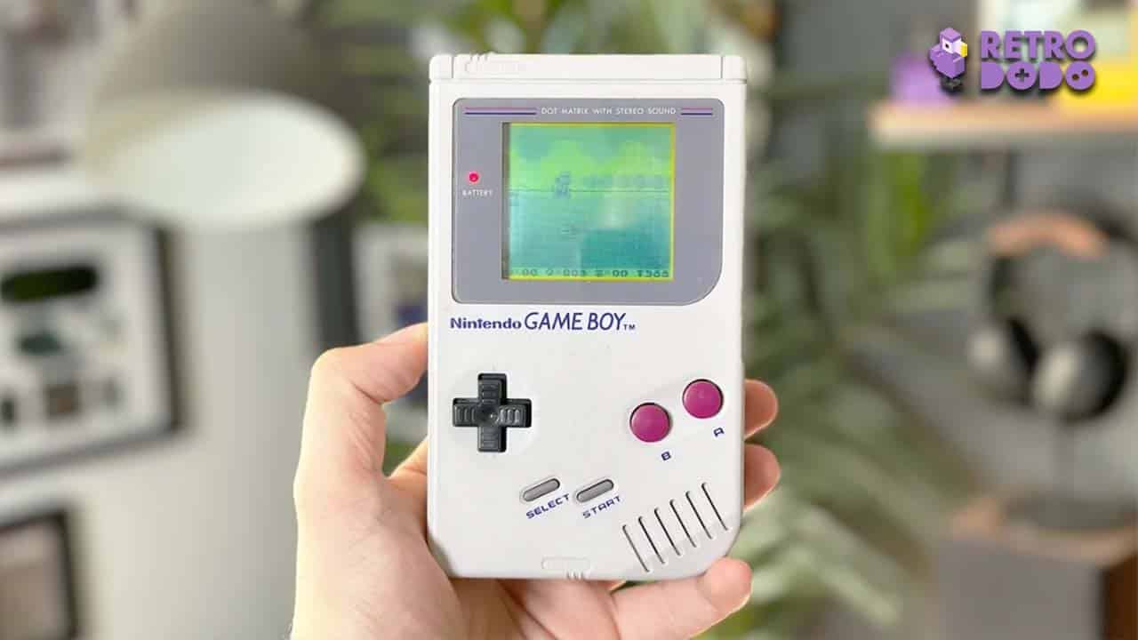 Brandon holding a grey Game Boy DMG