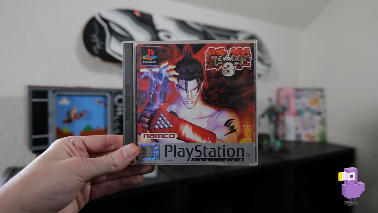 Tekken 3 game case in Rob's hand
